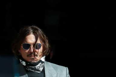 Actors Johnny Depp and Amber Heard at the High Court in London