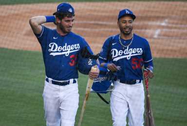 Dodgers stars Cody Bellinger (left) and Mookie Betts (right). (Robert Hanashiro-USA TODAY Sports)