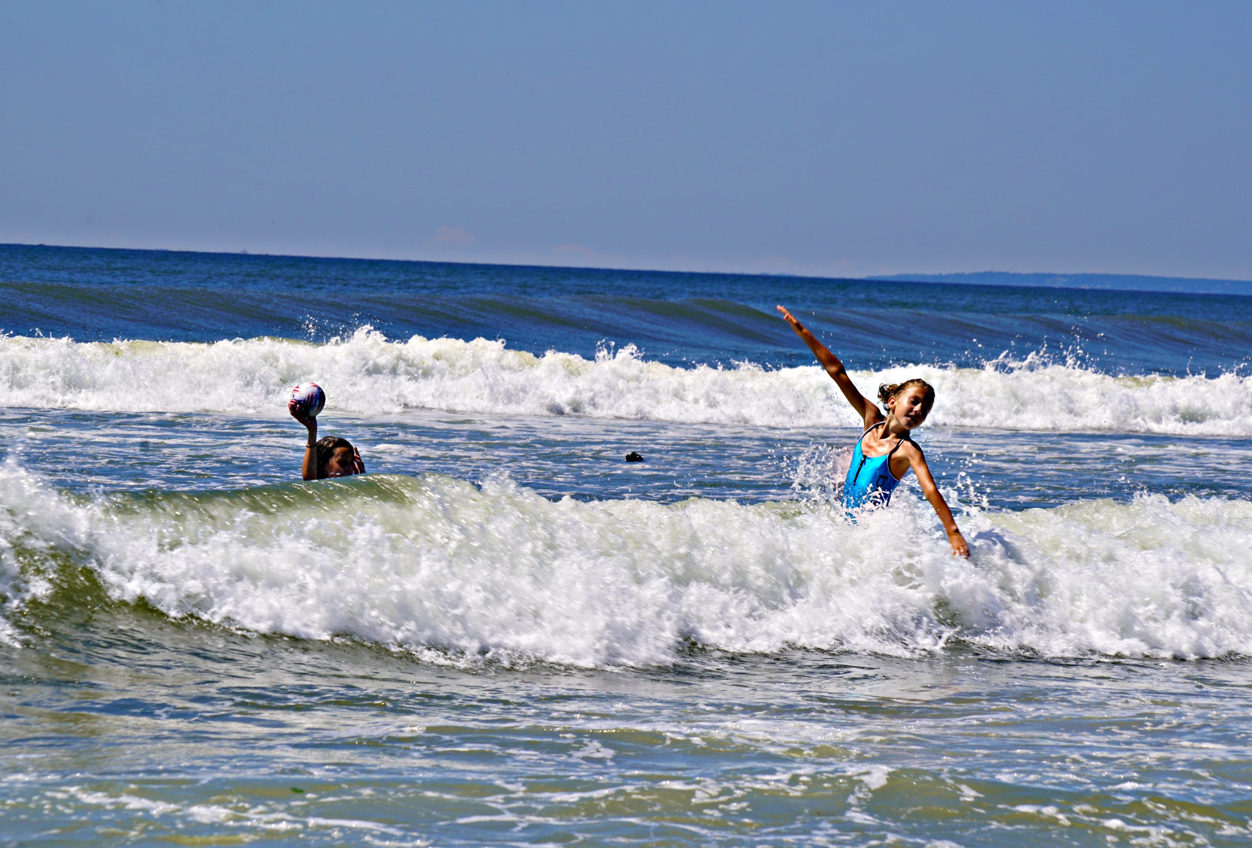 Beachgoers test the waters at Rockaway Beach as pandemic life presses on 4