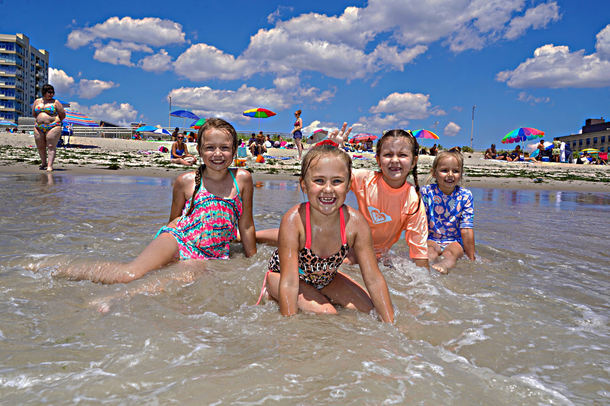 Beachgoers test the waters at Rockaway Beach as pandemic life presses on 3