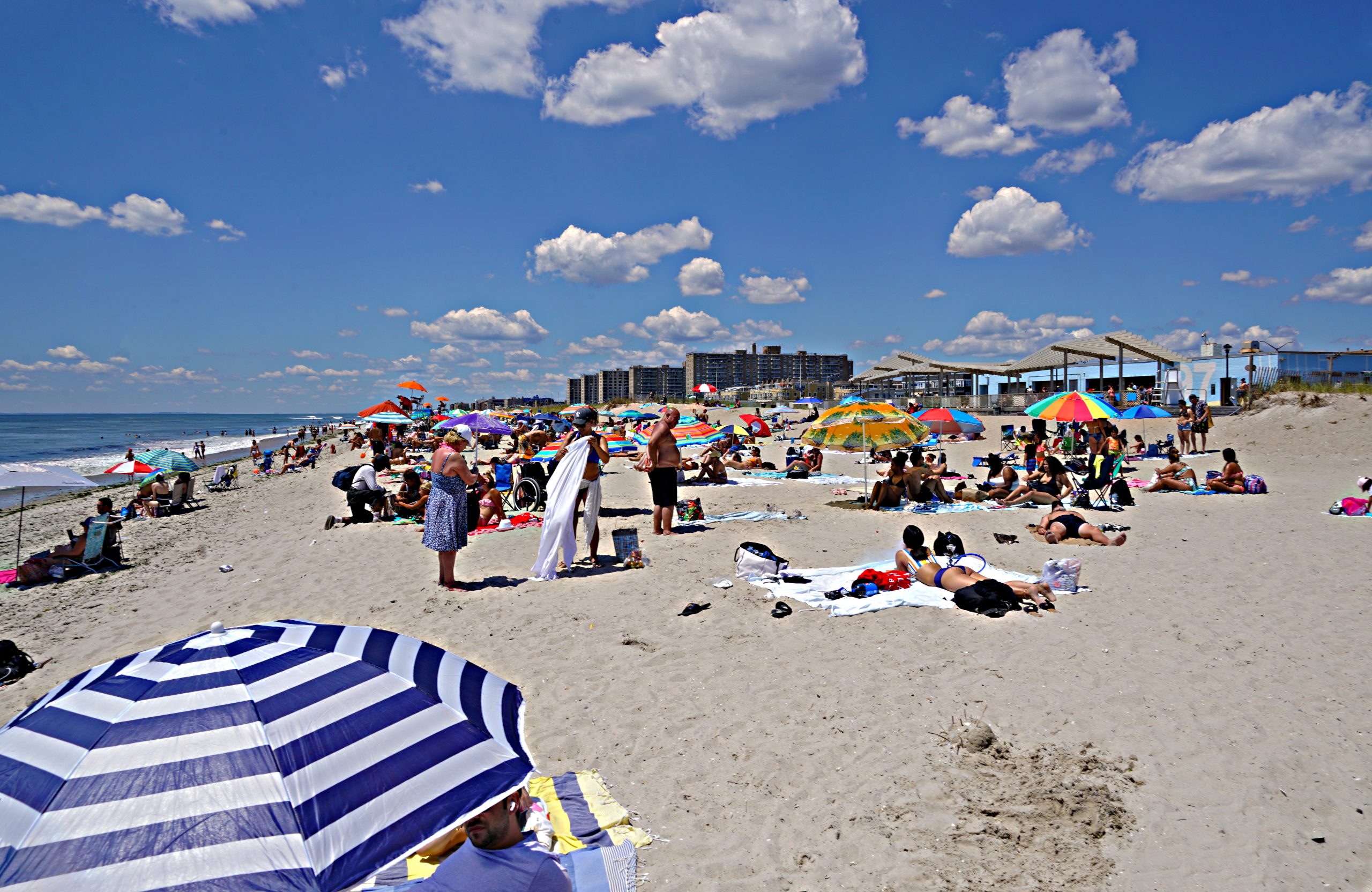 Beachgoers test the waters at Rockaway Beach as pandemic life presses on 2