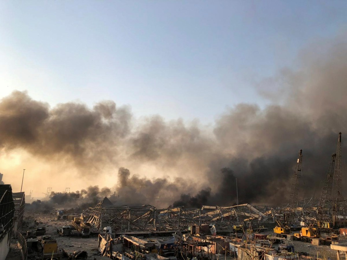 Smoke rises after an explosion was heard in Beirut