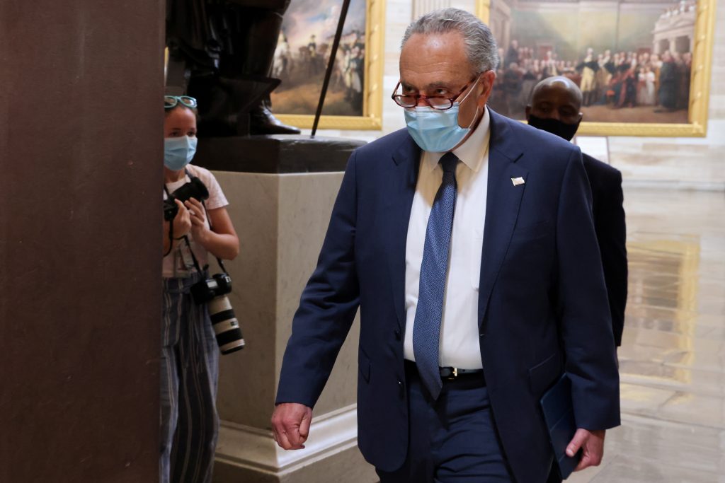 U.S. Senate Minority Leader Schumer walks to Pelosi’s office for coronavirus relief negotiations with Mnuchin and Meadows at the U.S. Capitol in Washington
