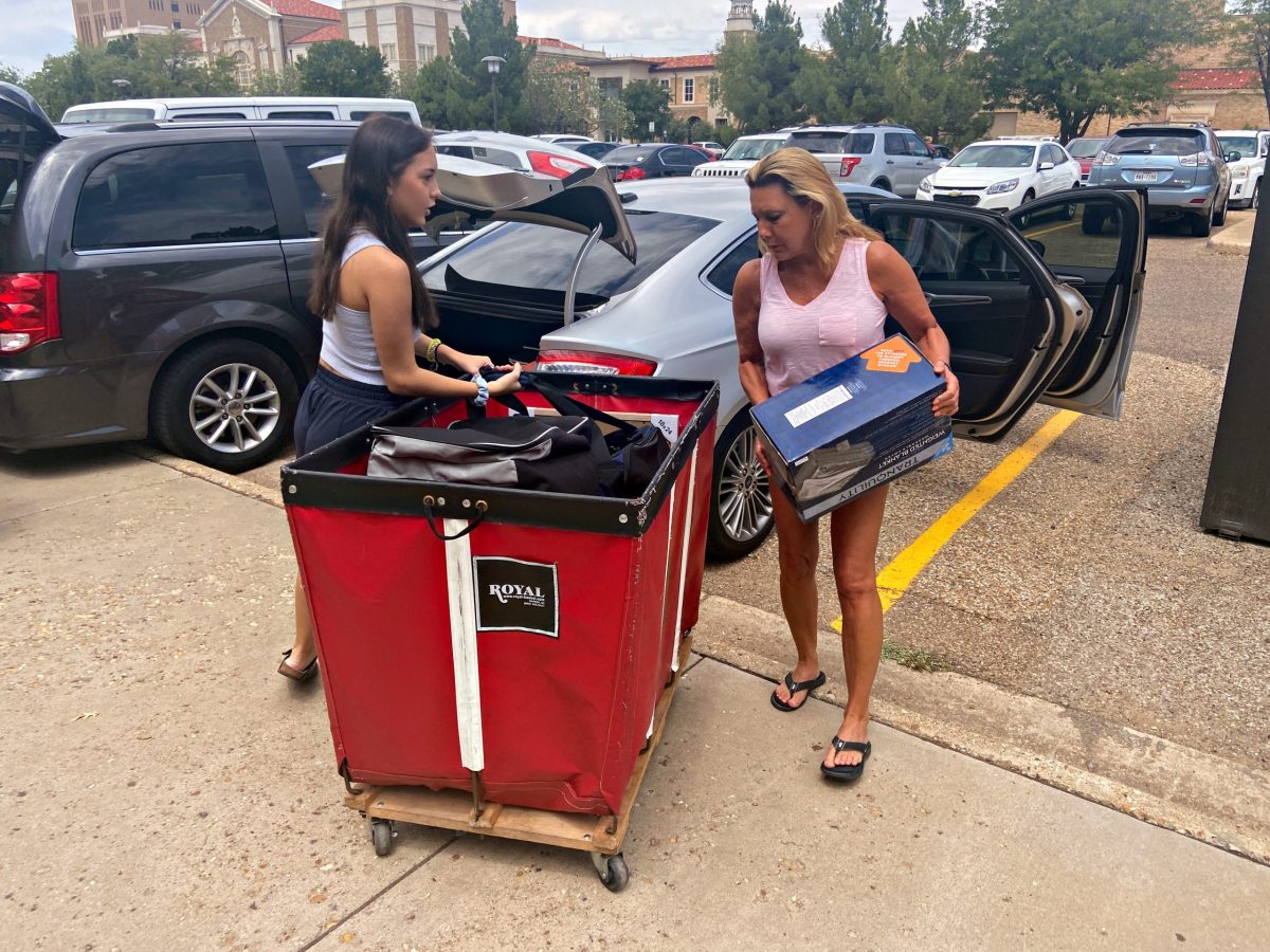 Kaitlyn Abercia is seen moving into her student residence at Gates Hall on the campus of Texas Tech University in Lubbock