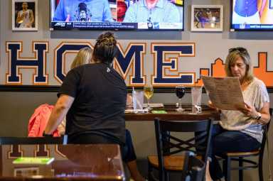 FILE PHOTO: A view of the Home Team Pub which has recently introduced strict social distancing rules after reopening from coronavirus disease (COVID-19) restrictions in the Syracuse suburb of Liverpool, New York,