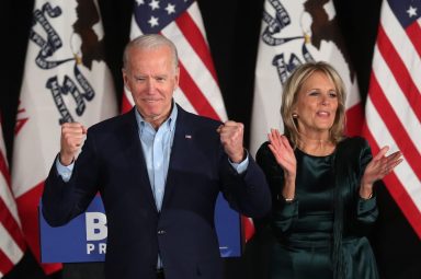 Democratic presidential candidate Joe Biden and his wife Jill appear at an election night rally in Des Moines