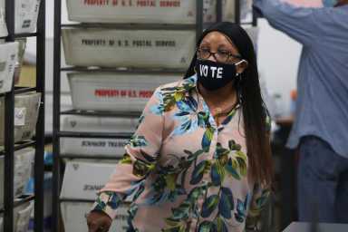 FILE PHOTO: Voters cast their ballots in Florida’s primaries