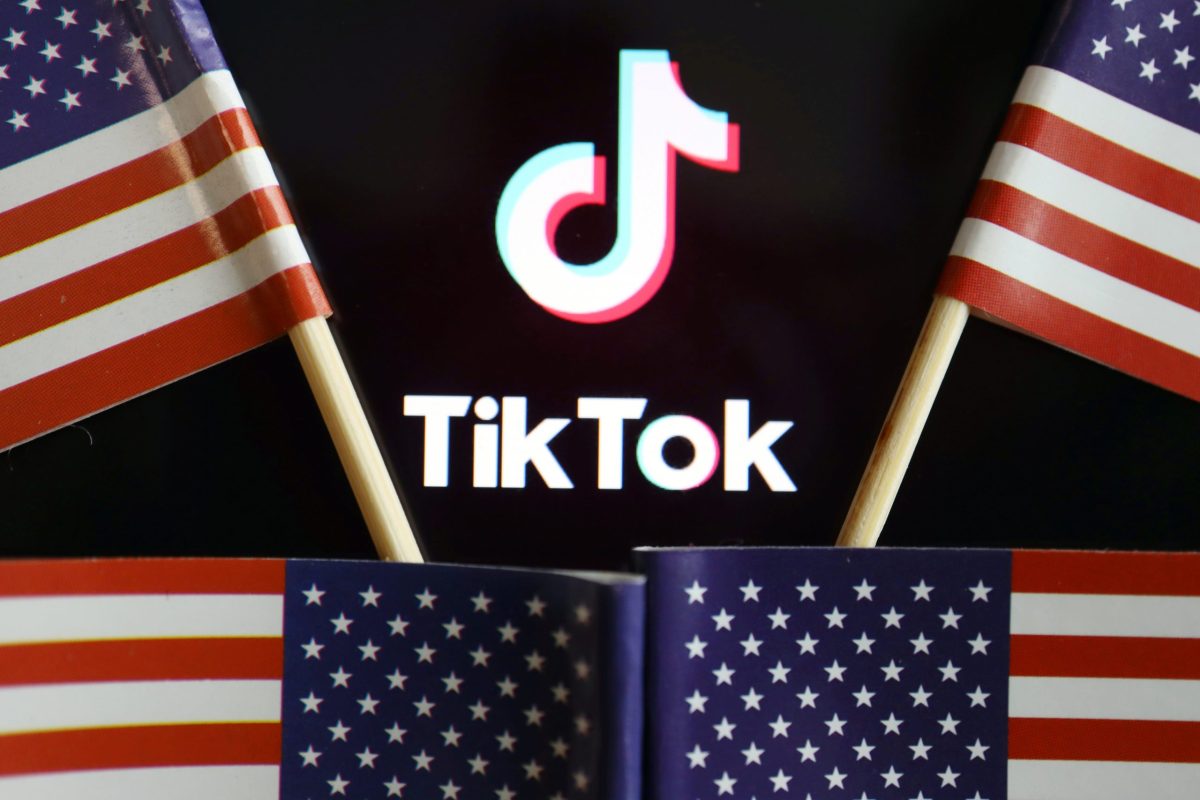 FILE PHOTO: Illustration picture of Tiktok with U.S. flags