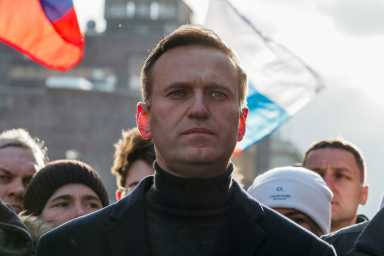 Putin critic Navalny under guard after likely poisoning, says Germany 31 FILE PHOTO: Russian opposition politician Alexei Navalny takes part in a rally to mark the 5th anniversary of opposition politician Boris Nemtsov’s murder and to protest against proposed amendments to the country’s constitution, in Moscow