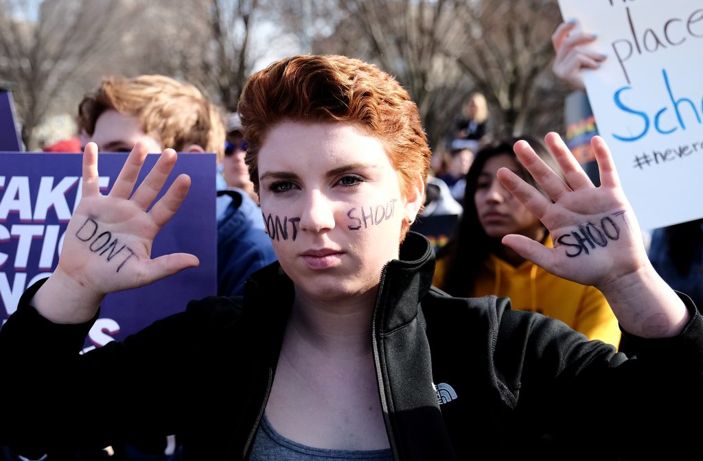 FILE PHOTO: Washington DC area students participate in a protest calling for stricter gun control as a part of the “Walkout Against Gun Violence” second annual event at the White House in Washington