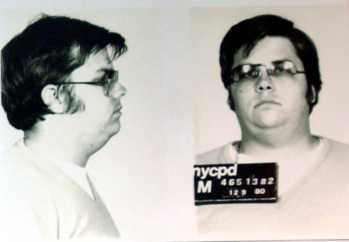 FILE PHOTO: Mug-shot of Chapman is displayed on 25th anniversary of Lennon’s death at NYPD in New York