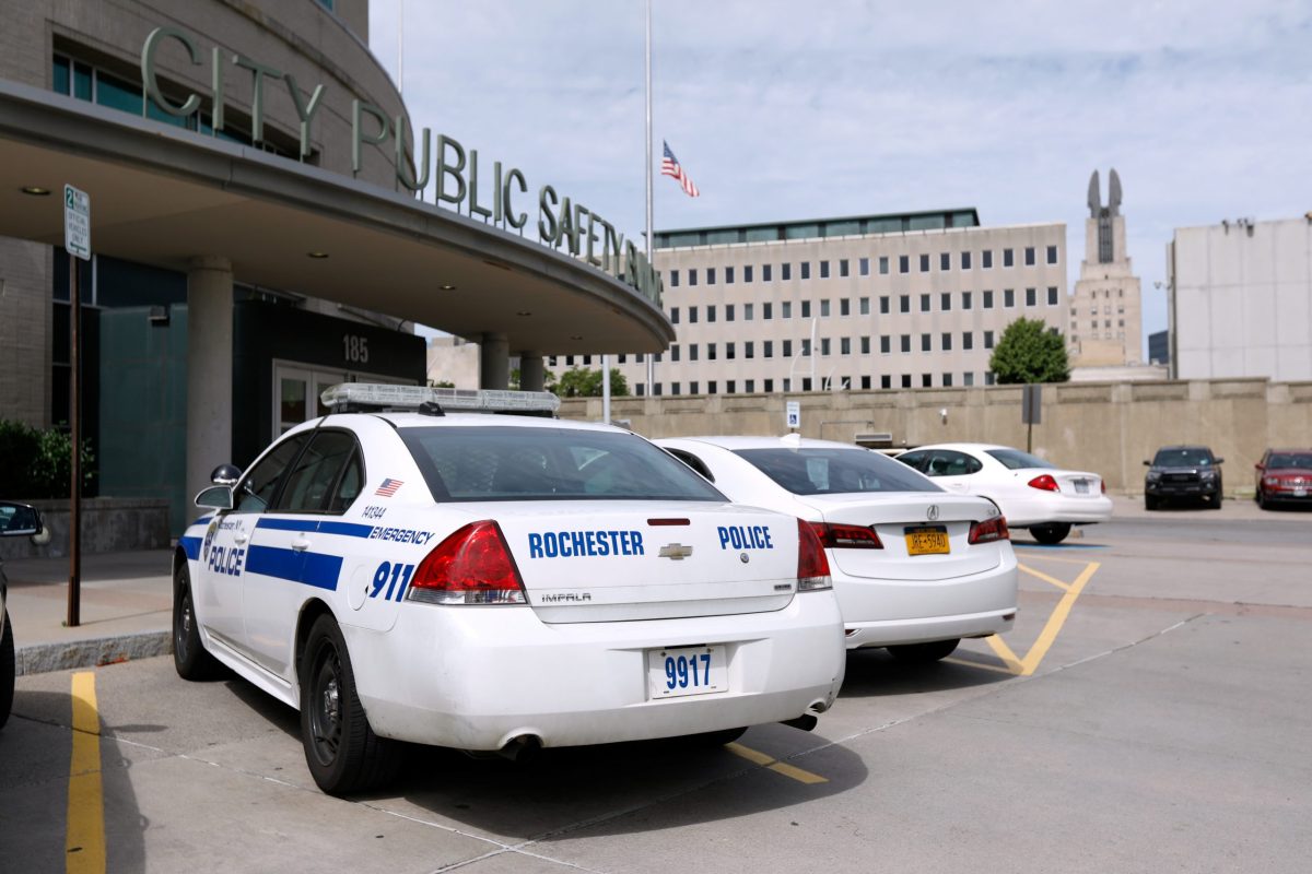 Police cars at City Public Safety Building in Rochester, New York