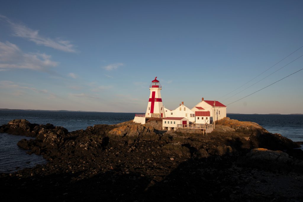 The Head Harbour Lightstation is seen in the evening twilight on Campobello Island