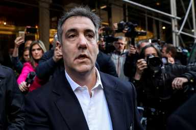 FILE PHOTO: Michael Cohen, a former lawyer for U.S. President Donald Trump leaves his apartment to report to prison in New York