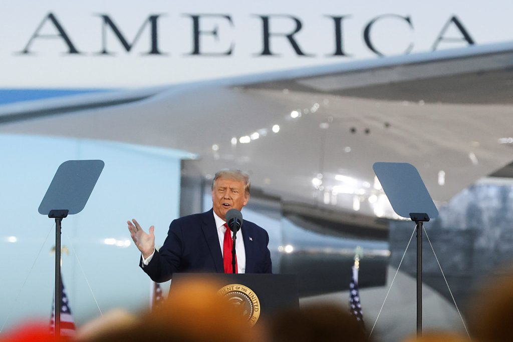 U.S. President Donald Trump speaks during a campaign event at MBS International Airport, in Freeland