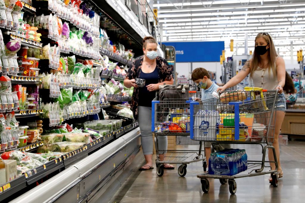 FILE PHOTO: Shoppers are seen wearing masks while shopping at a Walmart store in Bradford, Pennsylvania