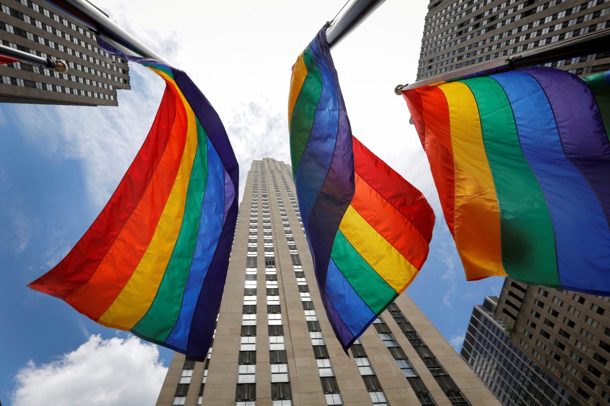 FILE PHOTO: Rainbow flags fly at Rockefeller Center in midtown Manhattan in support of the LGBT community in New York
