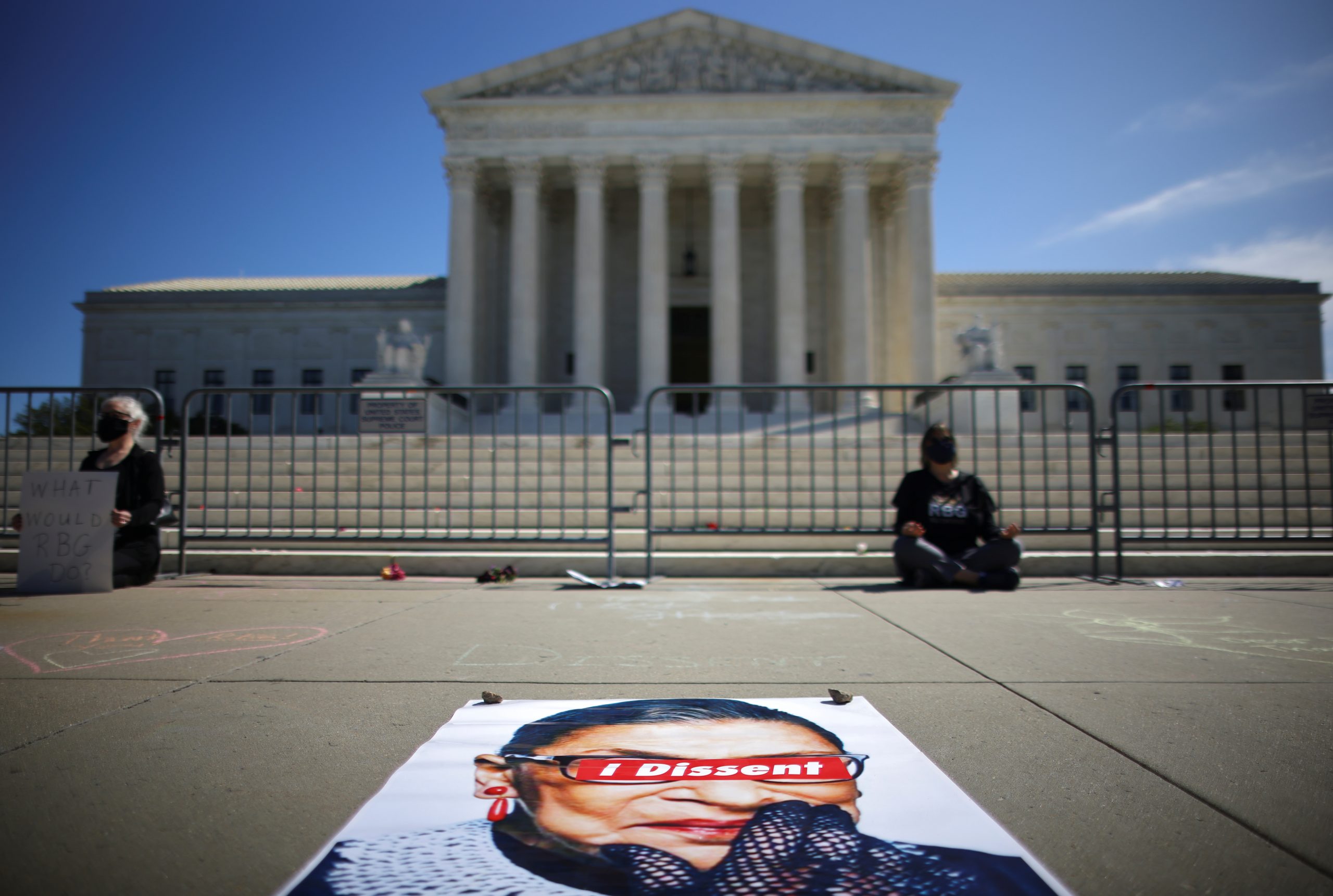 People gather in front of the U.S. Supreme Court following the death of U.S. Supreme Court Justice Ruth Bader Ginsburg, in Washington