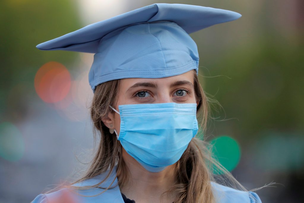 FILE PHOTO: Graduates gather at Columbia University during coronavirus disease (COVID-19) outbreak in Manhattan, New York City