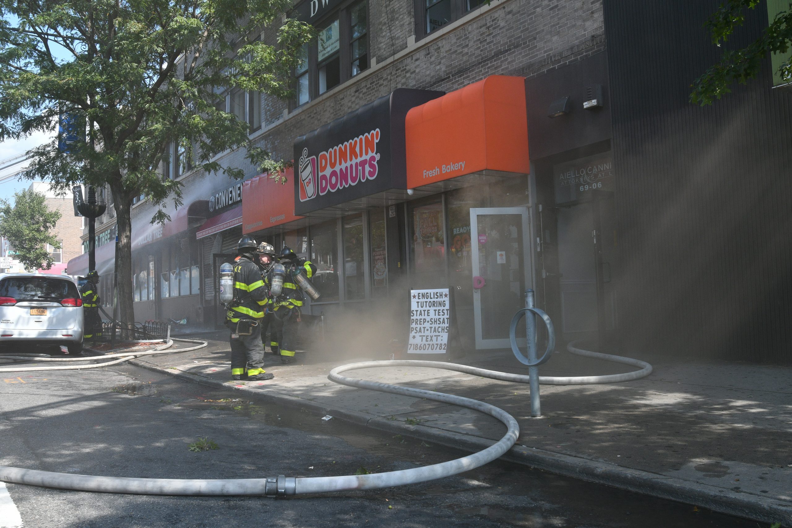 Three-alarm inferno hits Queens shopping strip, four firefighters hurt 2
