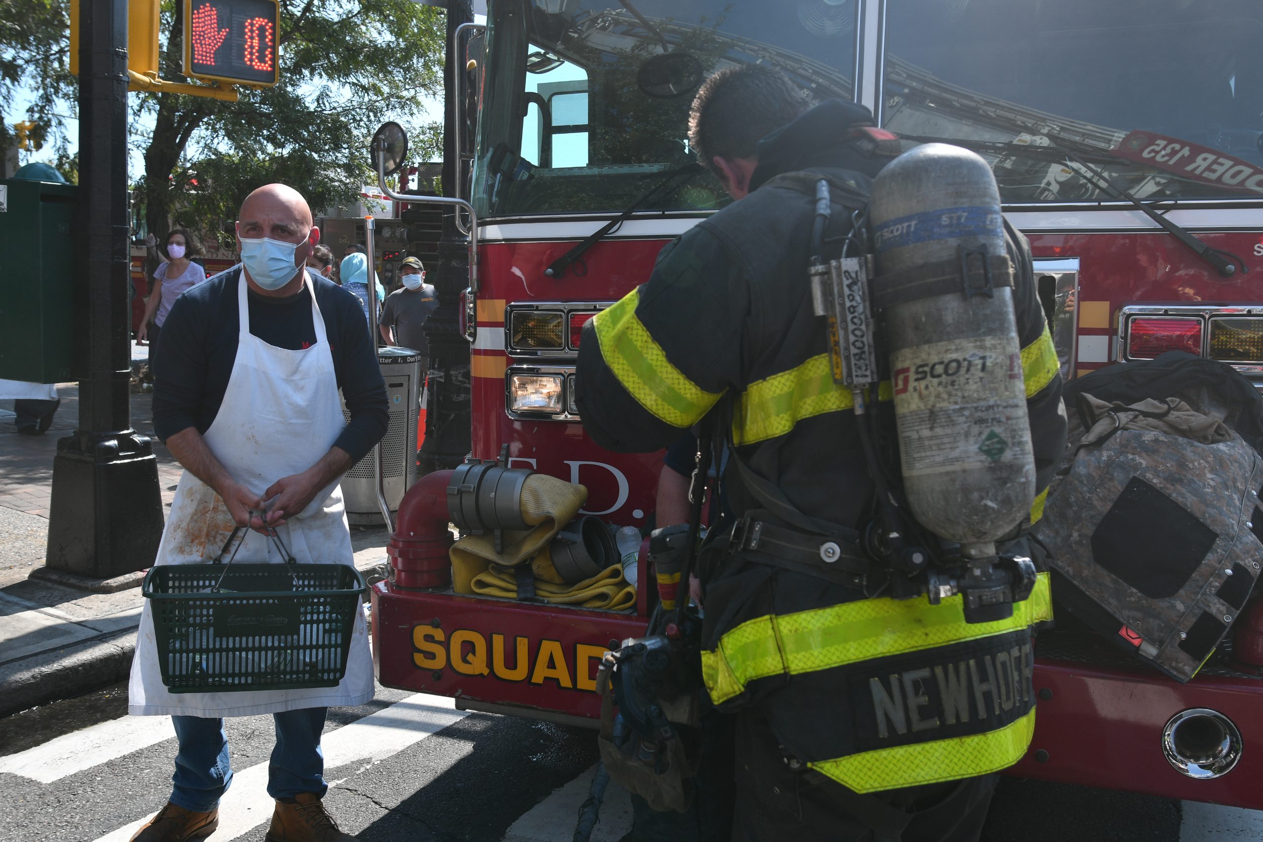 Three-alarm inferno hits Queens shopping strip, four firefighters hurt 4