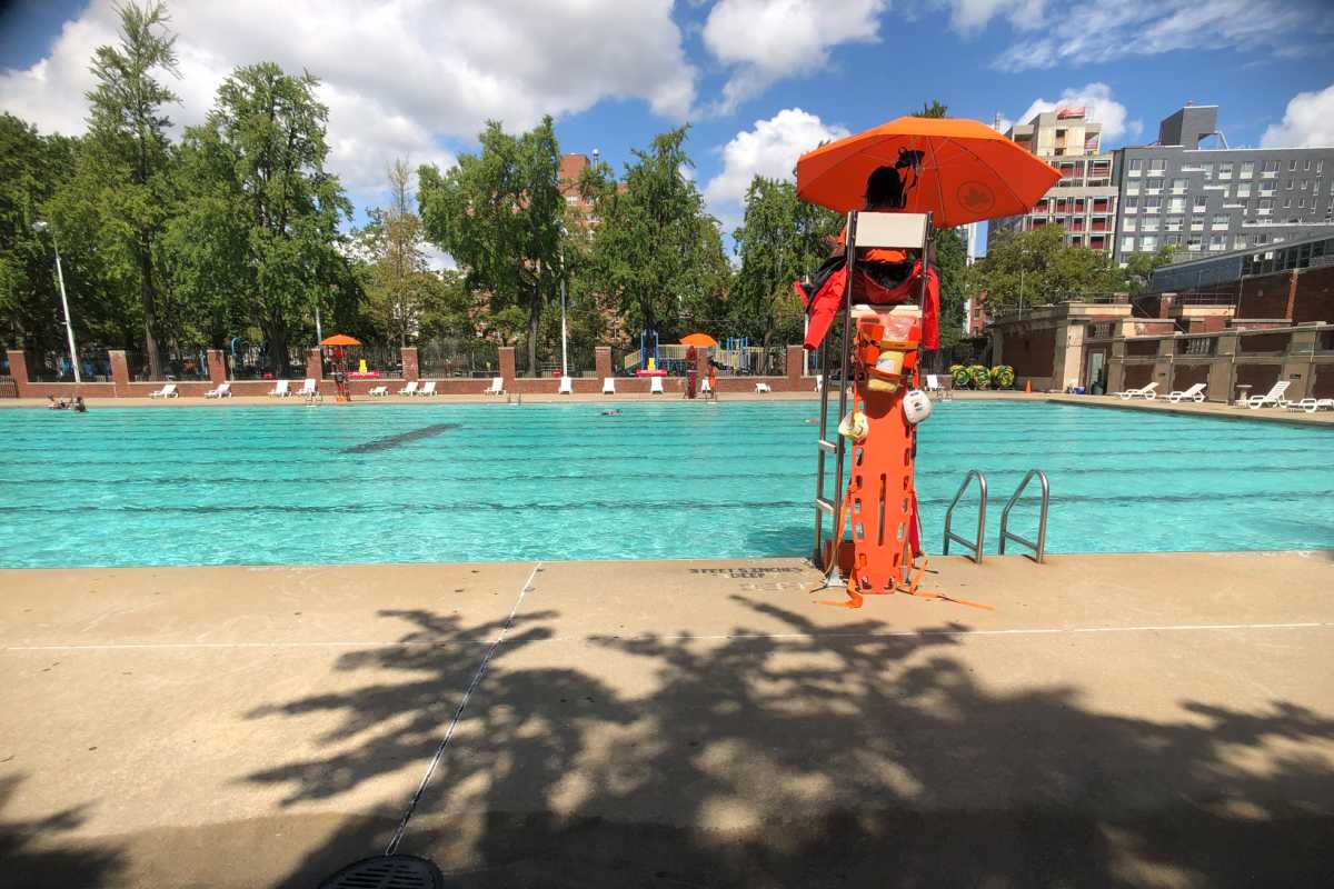 Lifeguards oversee the relatively quiet Hamilton Fish Pool