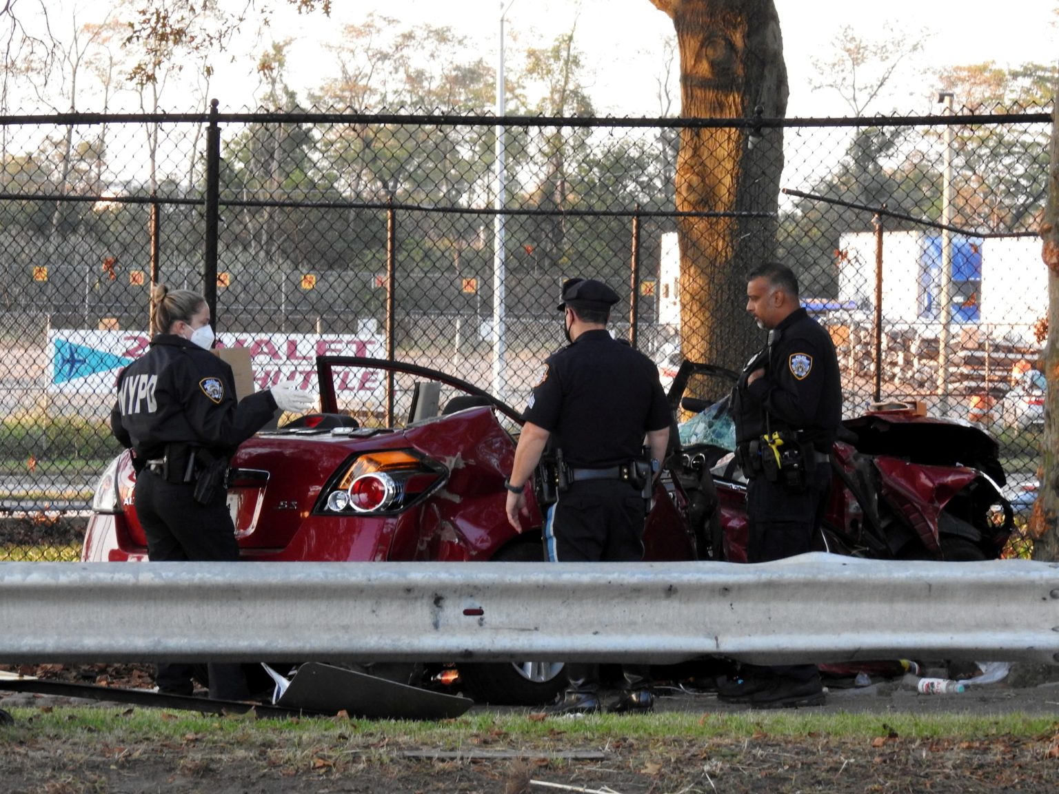 Three killed after car crashes into tree in Queens and bursts into