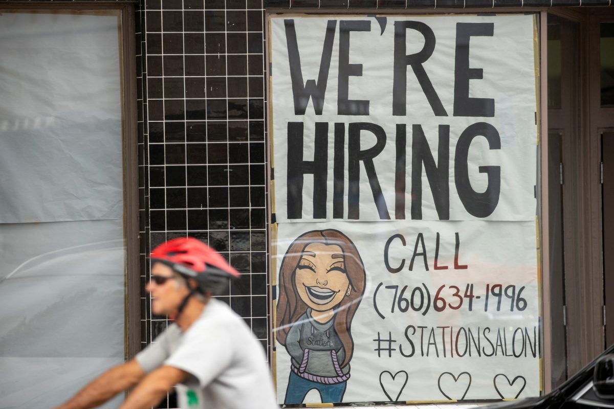 FILE PHOTO: A new business advertises for workers as it prepares to open up during the outbreak of the coronavirus disease in California
