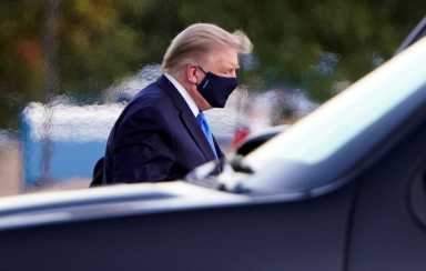 FILE PHOTO: U.S. President Trump arrives to spend at least several days at Walter Reed National Military Medical Center in Bethesda
