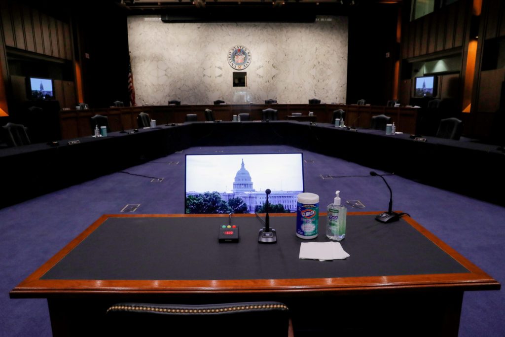 FILE PHOTO: The witness table sits ready for Supreme Court nominee Judge Amy Coney Barrett to begin her confirmation hearings in the U.S. Senate Judiciary Committee hearing room on Capitol Hill in Washington