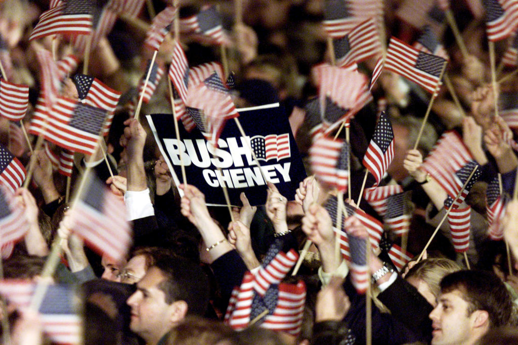 FILE PHOTO: Republican supporters react after tv networks announced that Texas Governor George W. Bush won the U.S. election in Austin