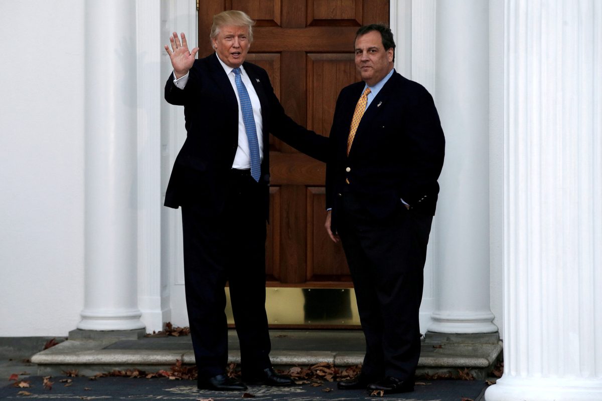 FILE PHOTO: U.S. President-elect Donald Trump stands with New Jersey Governor Chris Christie before their meeting at Trump National Golf Club in Bedminster,