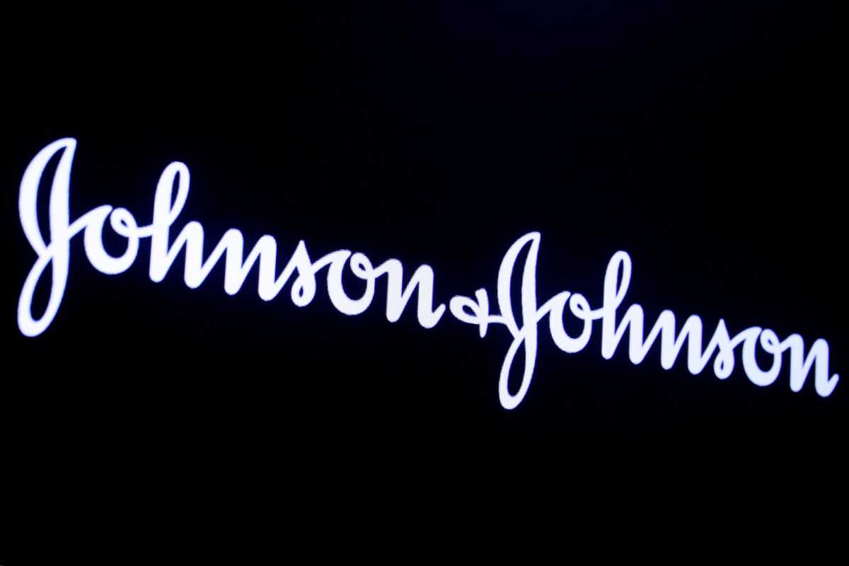 The company logo for Johnson & Johnson is displayed on a screen to celebrate the 75th anniversary of the company’s listing at the NYSE in New York