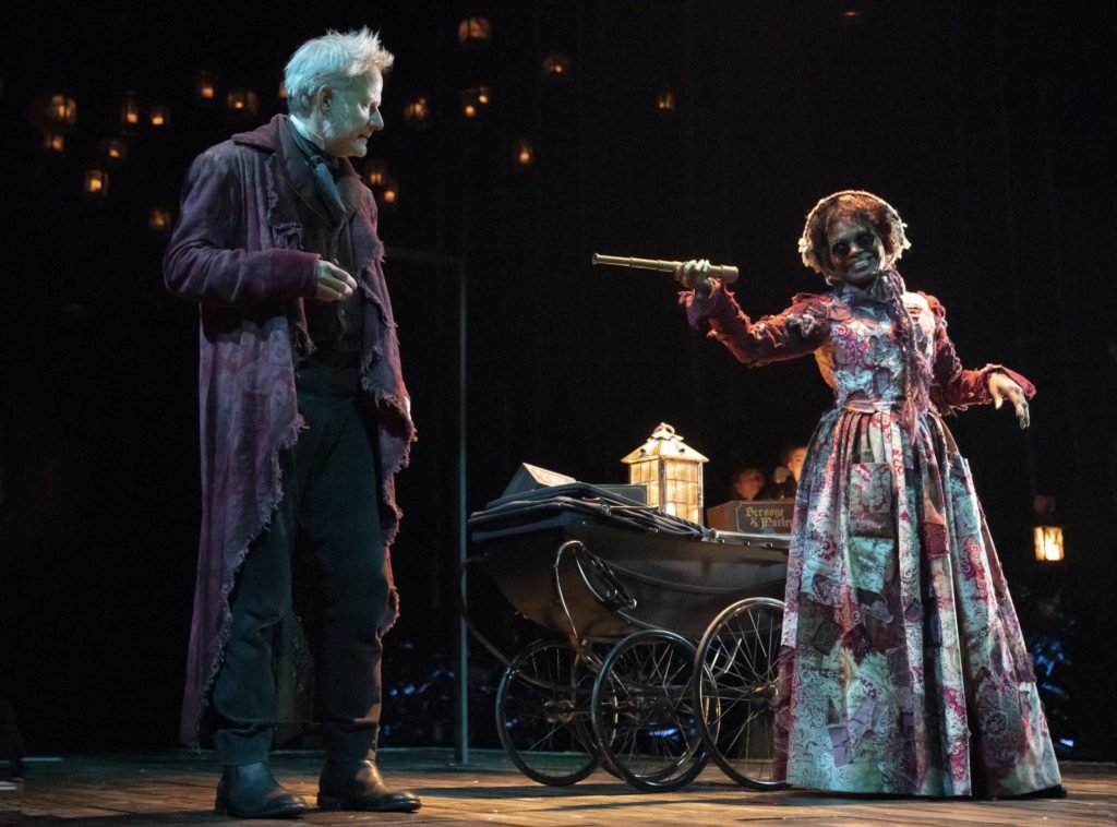 Campbell Scott as Ebenezer Scrooge and LaChanze as The Ghost of Christmas Present in A Christmas Carol on Broadway