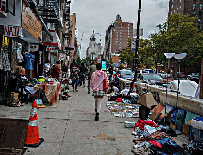 Passing through the junk market along East 14th Street and Avenue A.