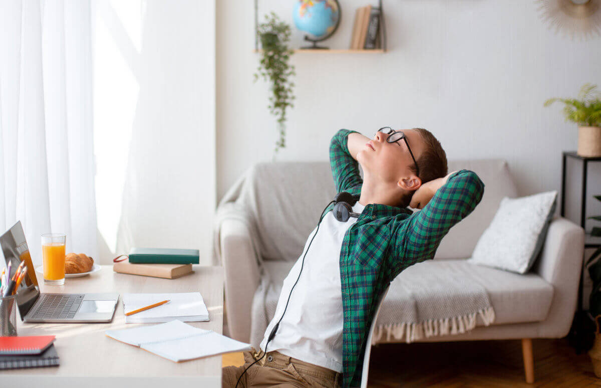 Boy Trying to Relax During Hectic Work Routine