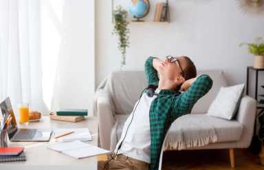 Boy Trying to Relax During Hectic Work Routine