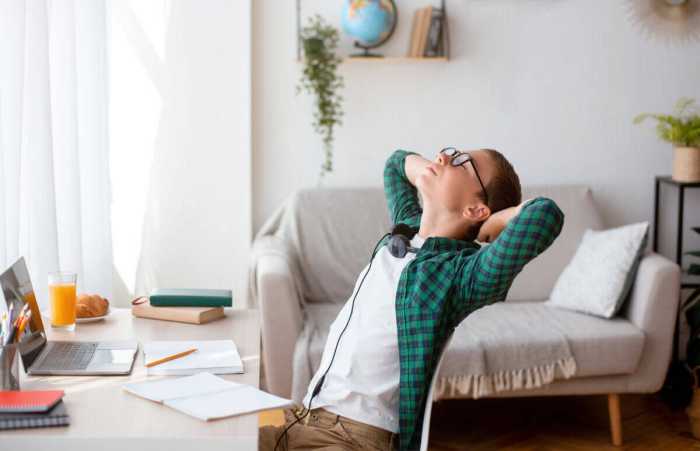 Boy Trying to Relax During Hectic Work Routine