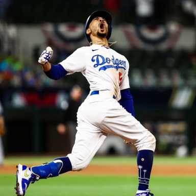 Dodgers outfielder Mookie Betts celebrates his eighth-inning