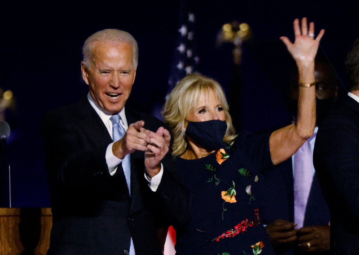 Democratic 2020 U.S. presidential nominee Joe Biden celebrates onstage at his election rally in Wilmington
