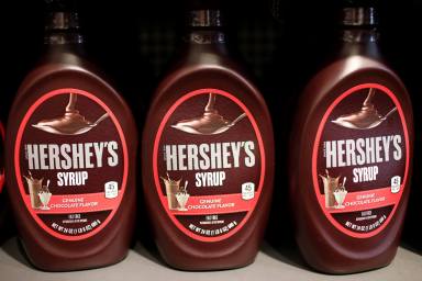 Containers of Hershey’s chocolate syrup are seen on display in a shop in New York City