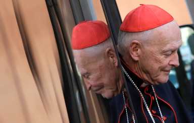 U.S. Cardinal McCarrick arrives for a meeting at the Synod Hall in the Vatican