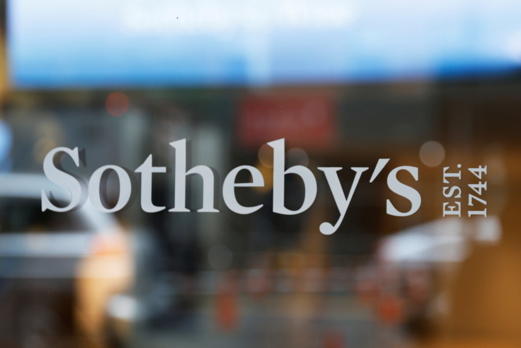 A sign marking Sotheby’s headquarters is seen on the Upper East Side of New York City