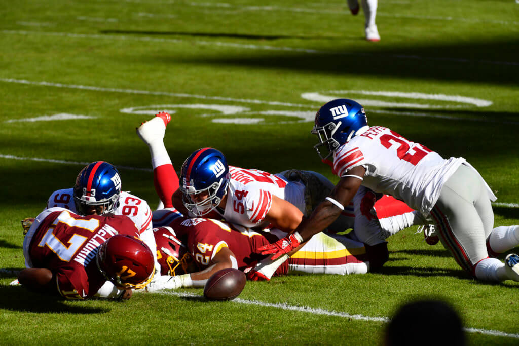 Giants take advantage of mistakes, hold off Washington for second win