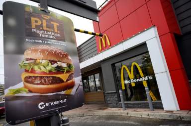 FILE PHOTO: A sign promoting McDonald’s “PLT” burger with a Beyond Meat plant-based patty at one of 28 test restaurant locations in London, Ontario