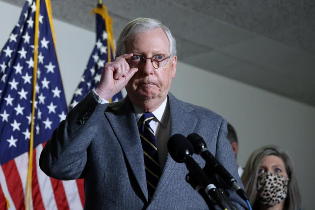 U.S. Senate Majority Leader McConnell arrives for a news conference on Capitol Hill in Washington