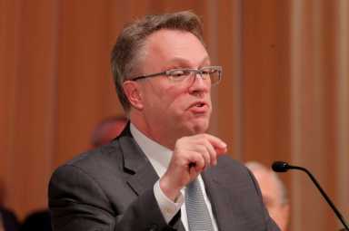 FILE PHOTO: John C. Williams, president and CEO of the Federal Reserve Bank of New York speaks to the Economic Club of New York in the Manhattan borough of New York