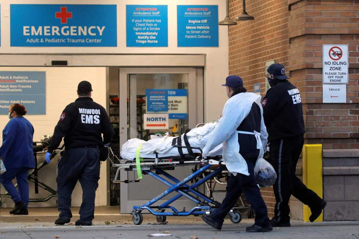 A patient arrives outside Maimonides Medical Center, as the spread of the coronavirus disease (COVID-19) continues, in Brooklyn, New York