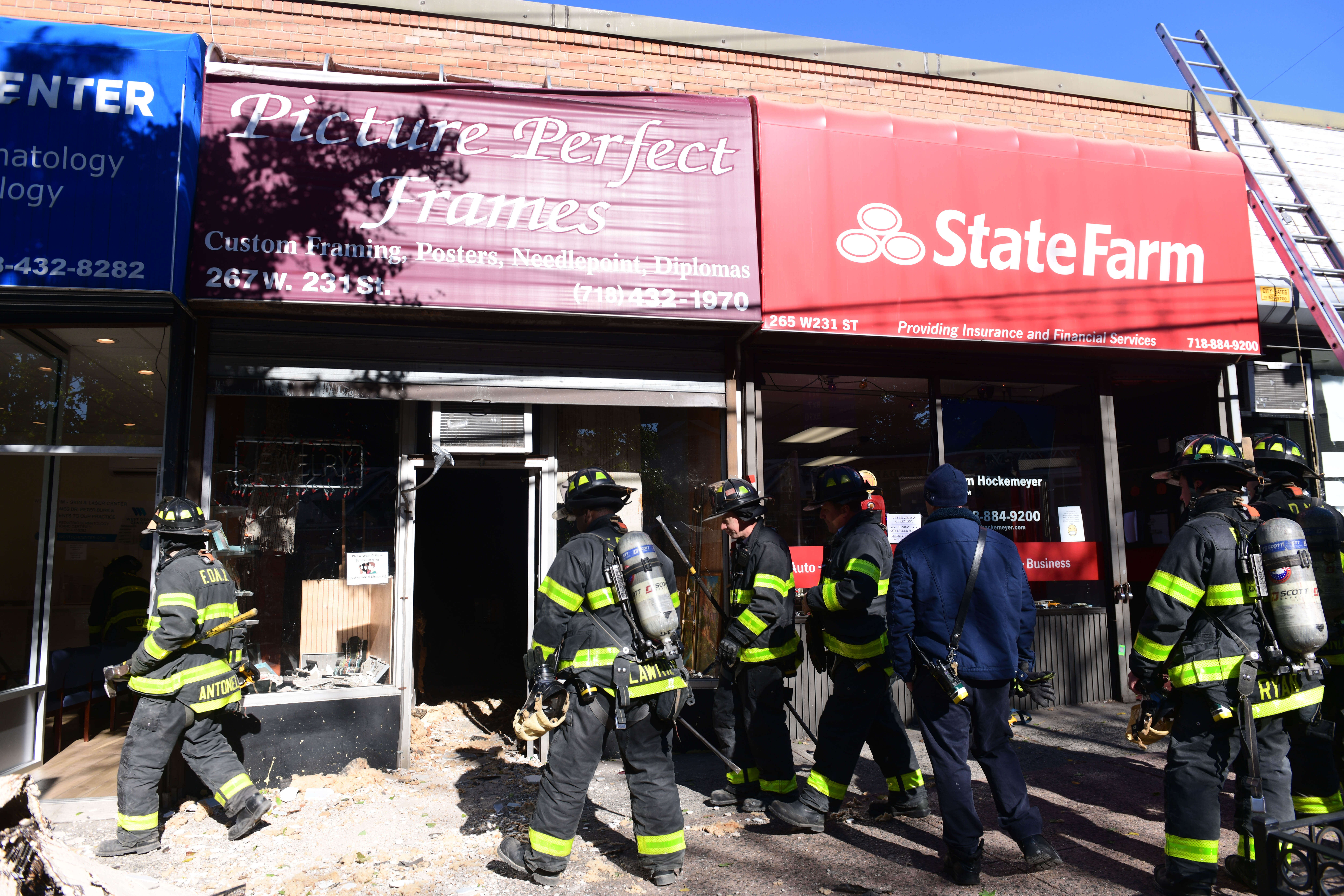 Mom-and-pop store owners survive ceiling collapse in venerable Bronx framing shop 9