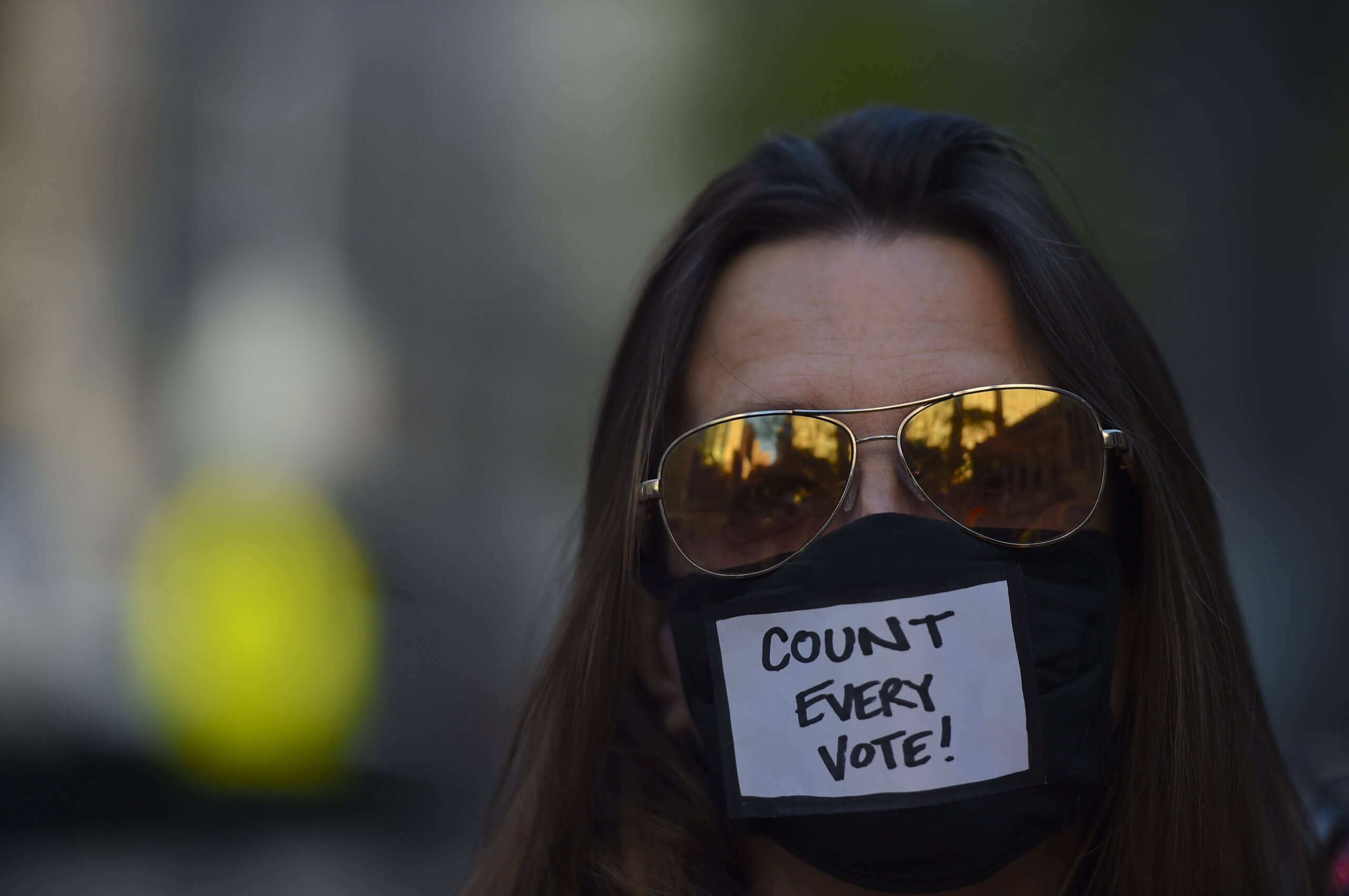 Anti-Trump groups protest president's false victory call in Midtown 5